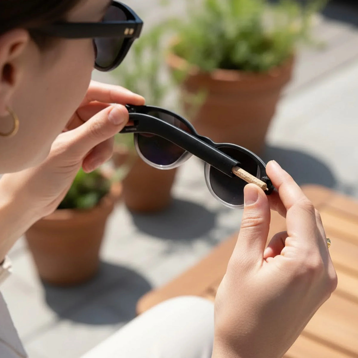 Sunglasses with hidden storage feature designed for discreet personal use