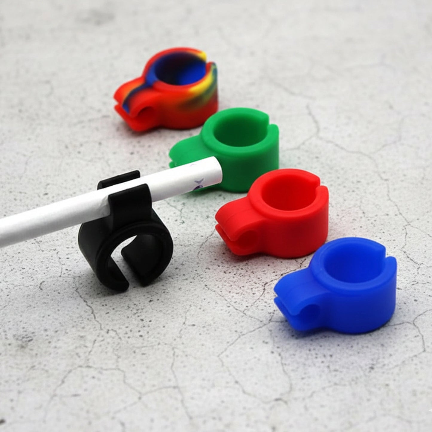 Flexible silicone smoke ring designed to hold a rolled joint hands-free
