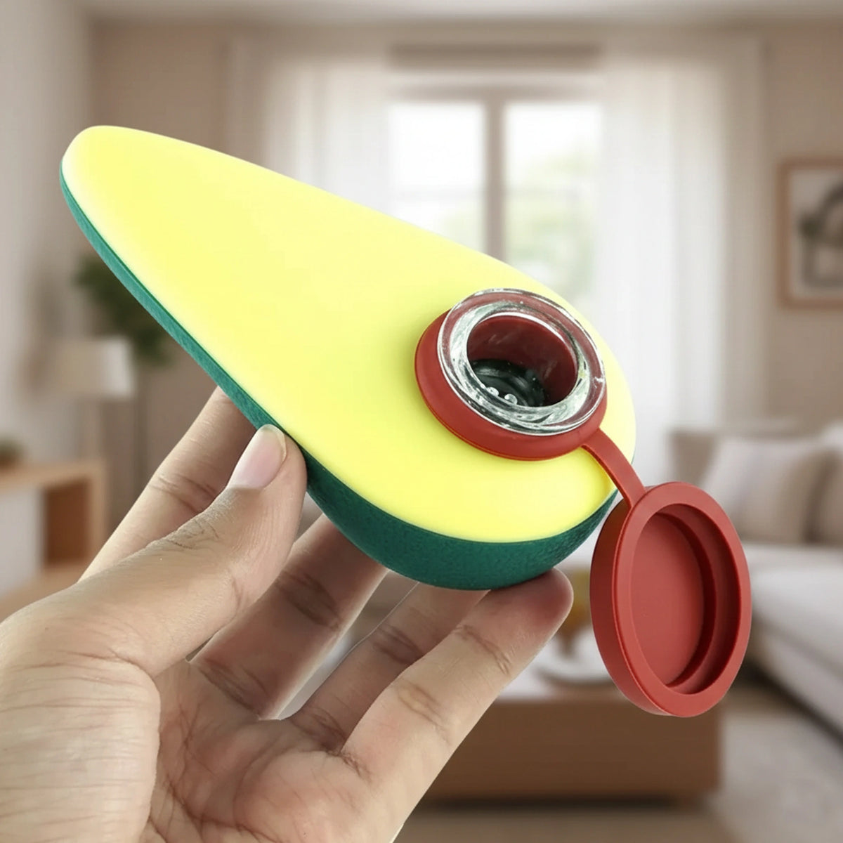 Avocado-shaped glass one-hitter pipe with realistic pit design