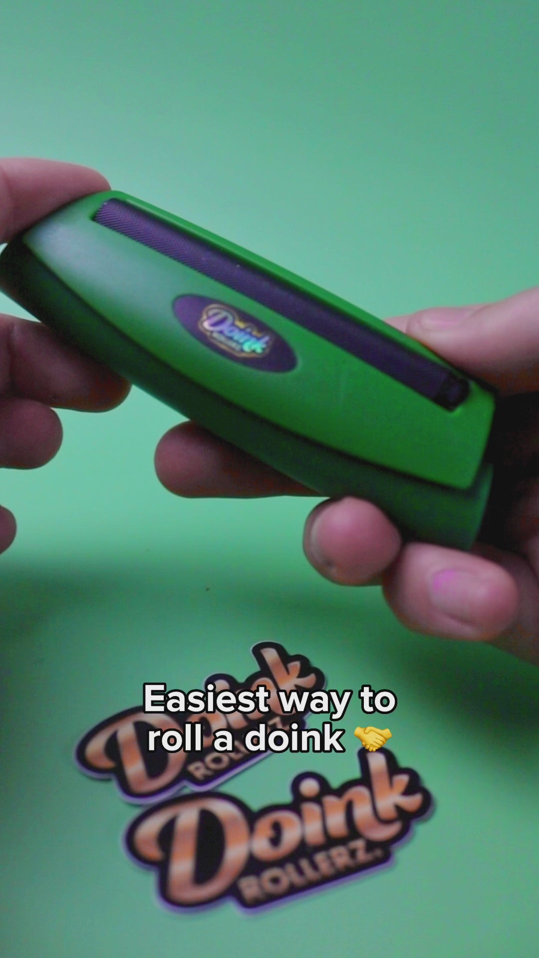 Compact joint roller held in hand for size reference